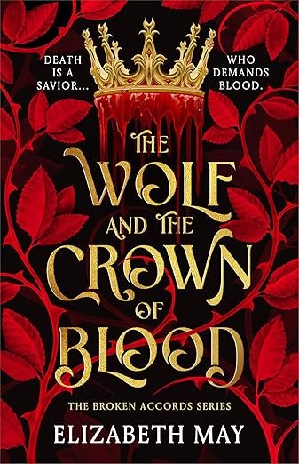 Cover of 'The Wolf and the Crown of Blood' by Elizabeth May. Features a gold crown dripping blood, surrounded by red leaves, with a dark, ominous tone.