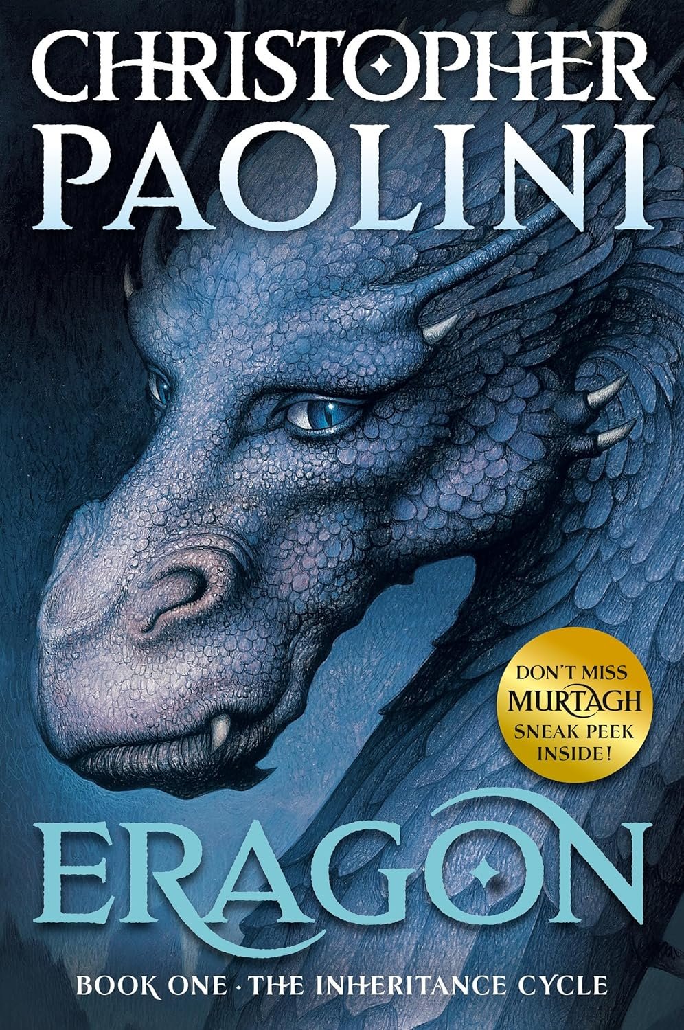 Cover of 'Eragon' by Christopher Paolini features a detailed, mystical blue dragon with textured scales. The tone is magical and mysterious.