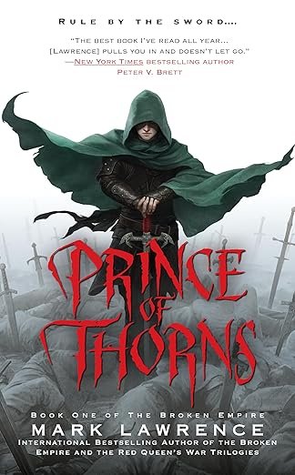 A hooded figure in green stands holding a sword, surrounded by a foggy field of swords. The title 'Prince of Thorns' is in bold red letters below.