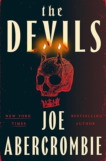Book cover of 'The Devils' by Joe Abercrombie. Features a red skull with two burning candles on top, against a dark background. Ominous and eerie tone.